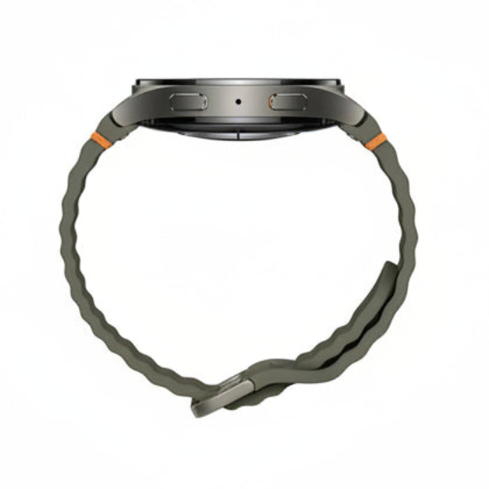 Samsung Galaxy Watch 7 44mm Green on desk next to wireless earbuds and keys for lifestyle flatlay