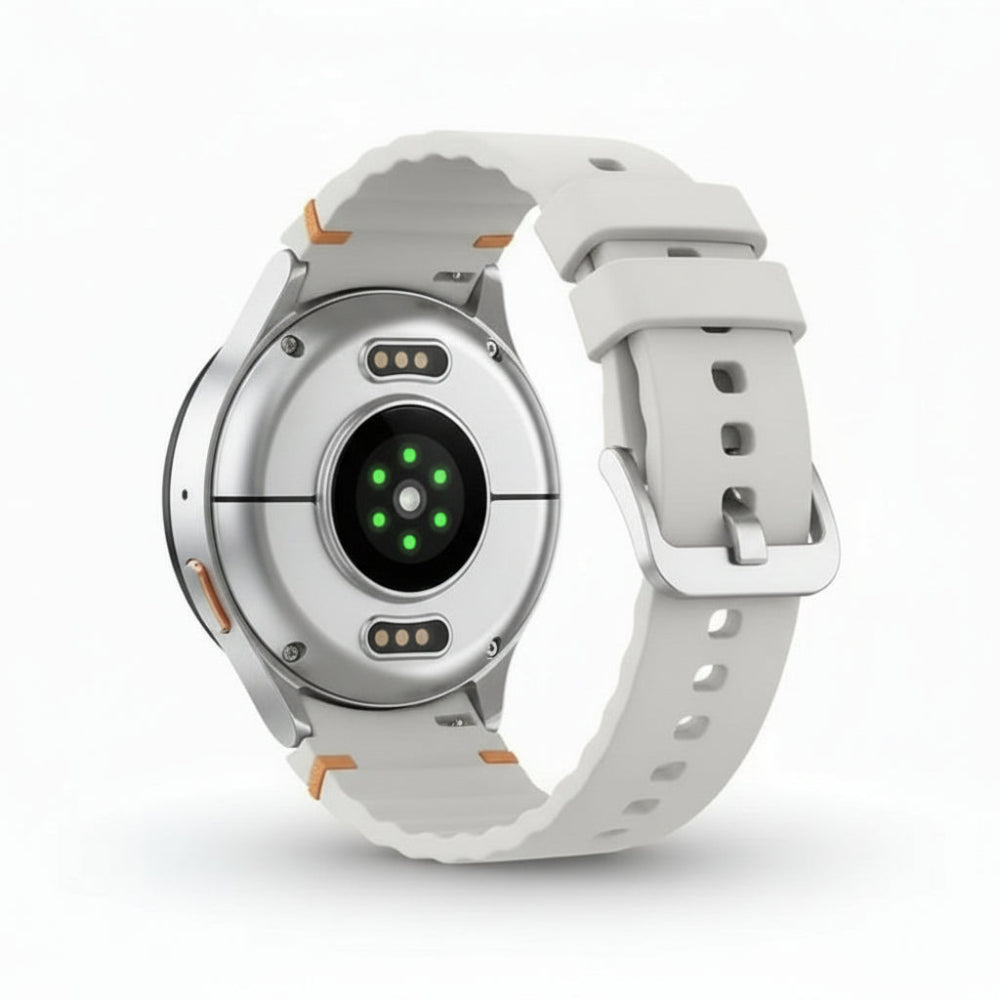 Product shot of Galaxy Watch7 44mm Silver with box, charging puck and documentation arranged on a table.