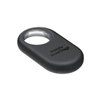 Galaxy SmartTag2 Black partially submerged in shallow water to demonstrate IP67 water resistance.